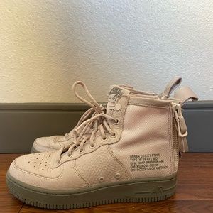 Light pink Nike high tops US women’s 6.5